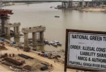 Prayagraj illegal bridge, NGT rebukes NMCG, Ganga river bridge violation, NMCG news Hindi, National Green Tribunal latest order, Ganga floodplain construction, RVNL bridge controversy, Environmental law news India
